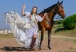 South African actress and singer Anlia Etzebeth, who will be singing the National Anthem on Saturday at the Hollywoodbets Durban July, is pictured alongside Wish List, one of the Hollywoodbets Durban July favourites, at Summerveld on Wednesday. Photo credit: Chase Liebenberg